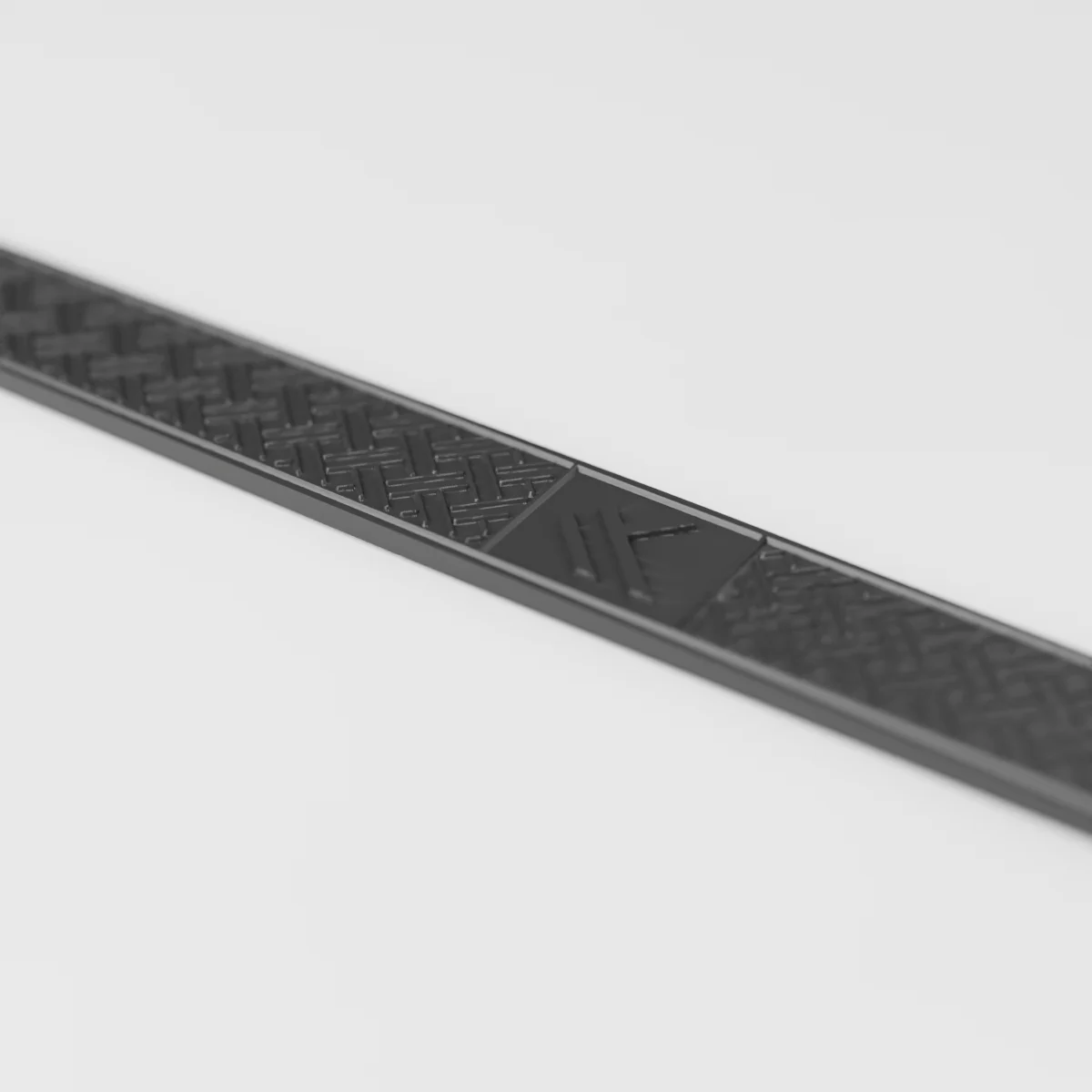 Close-up of the raised weave and framed K on the Kuli Weave strap